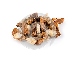 Pile of peeled walnuts close-up isolated on white background