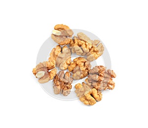 Pile of peeled walnuts on white background, top view