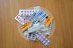 A pile of pills in blister packs. Blister packs full of of multi-colored pills.of pills in blister packs. Blister packs full o