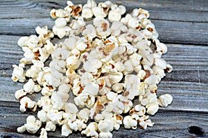Pile of Popcorn and also called popped corn, popcorns or pop-corn, variety of corn kernel that expands and puffs up when heated