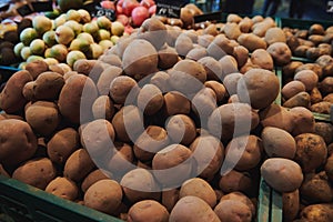 A pile of potatoes at the market place.