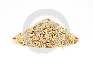 Pile of raw brown rice on white background