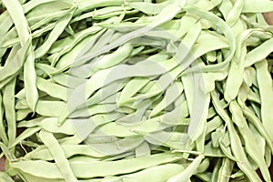 A pile of raw green bean pods