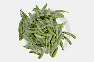 Pile of raw green organic snap peas.