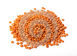 A pile of raw red lentils isolated on a white background. useful product. healthy lifestyle