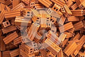 Pile of Red Bricks in the Construction Work Site