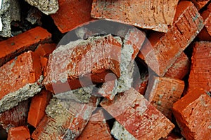 pile of red bricks outside the house