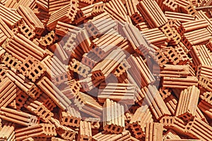 Pile of red bricks texture background