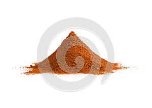 Pile of red ground paprika isolated on white