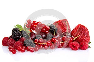 Pile of red summer fruits or berries