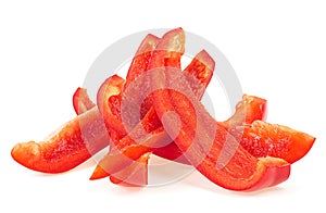 Pile of red sweet bell pepper sliced strips isolated on white background. Red paprika
