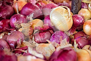 Pile of red and white onions