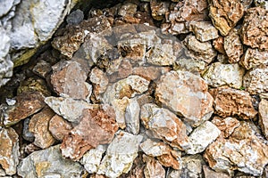 Pile of red and whte stones in a forest Polish jurrasic.