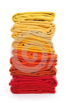 Pile of red and yellow folded clothes