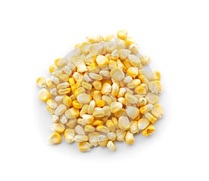 Pile of ripe corn kernels on white background