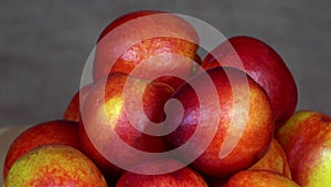 Pile of ripe nectarine fruits. Healthy nutrition. turntable counterclockwise