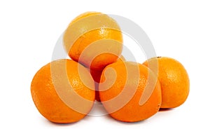 Pile of ripe oranges isolated on white background