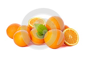 Pile of ripe oranges isolated on white background