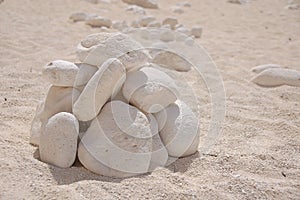 Pile of rocks on sandy beach