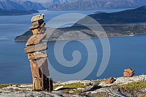 Pile of rocks on the top of a mountain in Norway, a rock on another rock