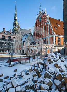 Pile of rocks under the snow. The House of the Blackheads. Riga, Latvia