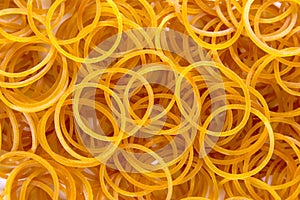 Pile of rubber bands as a background isolated on white