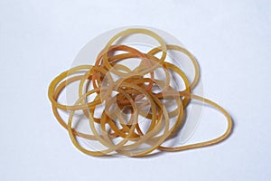Pile of rubber bands  on white background