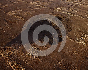 Pile of rubble on an old cracked tarmac.