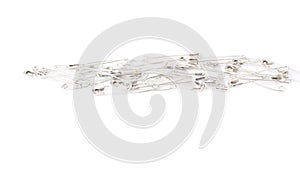 Pile of safety pins isolated on white background