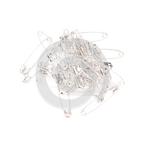 Pile of safety pins isolated on white background