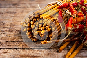 Pile of Salty bread sticks on a wooden table