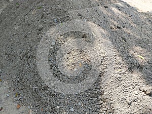 a pile of sand at a construction project site