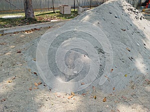 a pile of sand at a construction project site