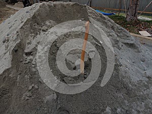a pile of sand at a construction project site