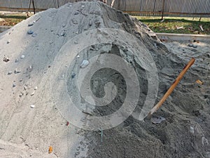 a pile of sand at a construction project site