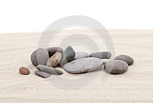 Pile of sand with sea stones
