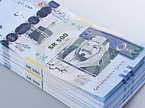 Pile of Saudi Riyal Banknotes of 500 with image of King Abdulaziz