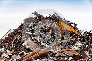 Pile of scrap metal. Waste collection and recycling.