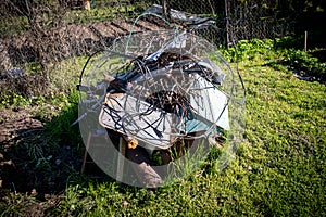 Pile of scrap metal in the yard. Collection and sorting of waste