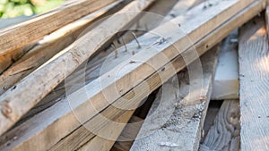 Pile of scrap wood from mattresses and palettes for recycled up-cycled DIY furniture making or wood carpentry projects. Wood