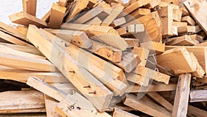 Pile of scrap wood from mattresses and palettes for recycled up-cycled DIY furniture making or wood carpentry projects. Wood
