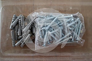 Screw and Plastic Dowels Wall Mount Anchor in the Storage Box