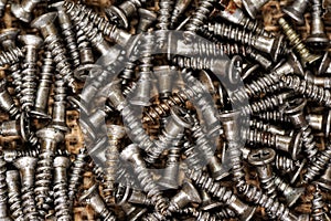 Pile of screws on the matting