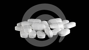 Pile of Sertraline 100mg pills on black background