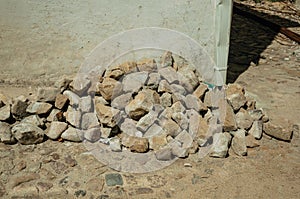 Pile of setts stones and sand in a construction site