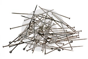 Pile of sewing pins on white backgound