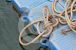 Pile of ship rope on floating pontoon