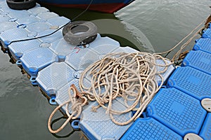 Pile of ship rope on floating pontoon