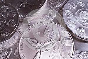 Pile of Silver Libertad Coins