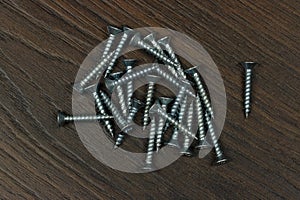 Screws on a wooden panel
